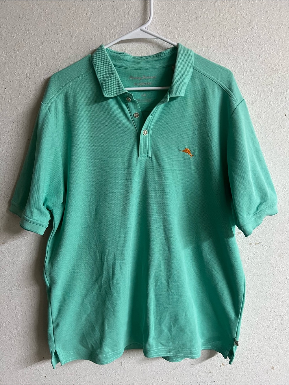 Tommy Bahama Short Sleeve Polo in Aqua with Orange Dolphin